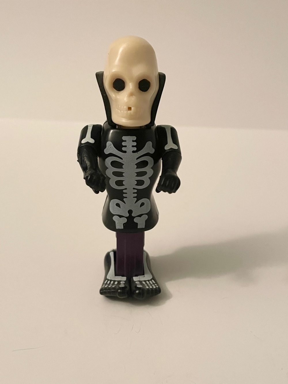 Vintage PEZ Halloween Skull & Skeleton Body Parts Purple Dispenser